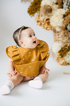 Sunrise Frill | Snuggle Bib Waterproof